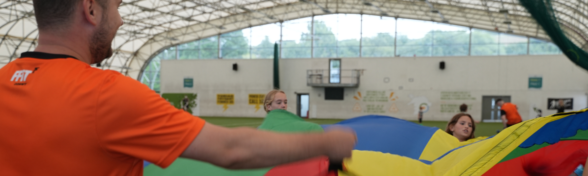 Picture of children playing with a parachute