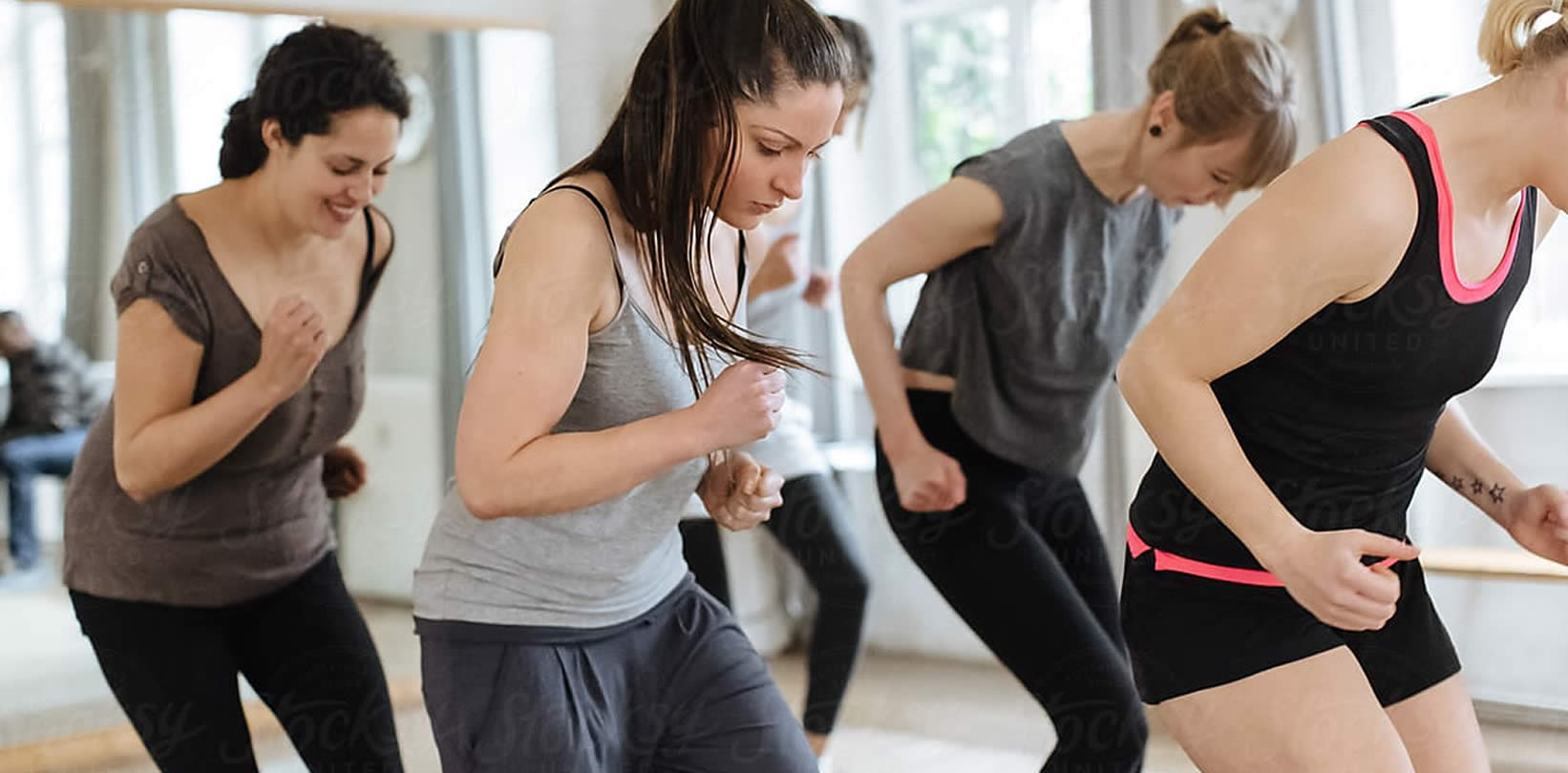 People taking part in fitness class.