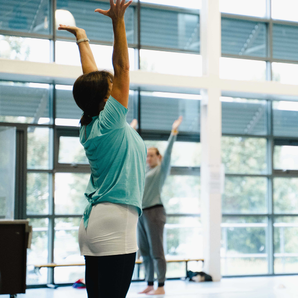 Picture of lady holding a Yoga stretch
