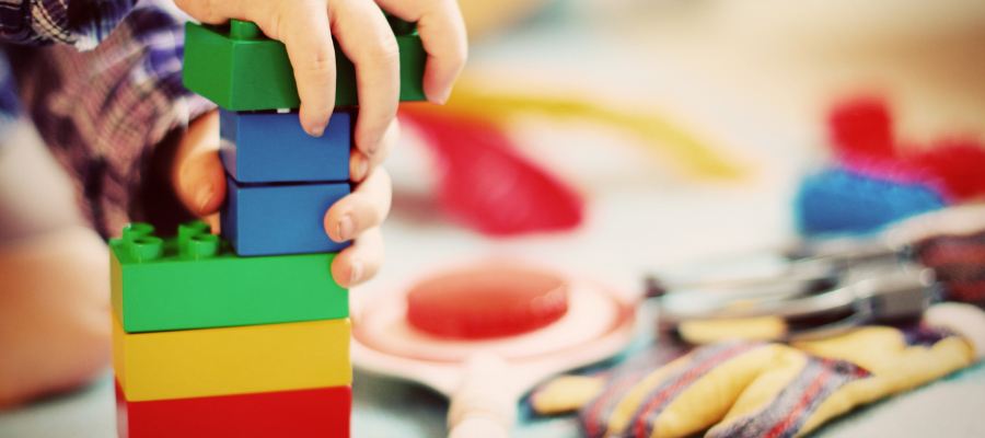 Child playing with building blocks
