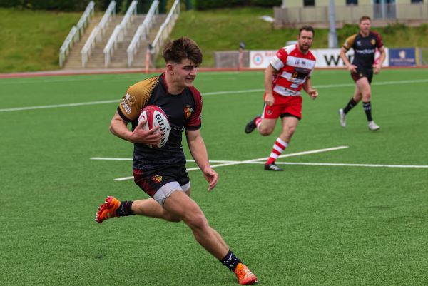 Photo of people playing rugby