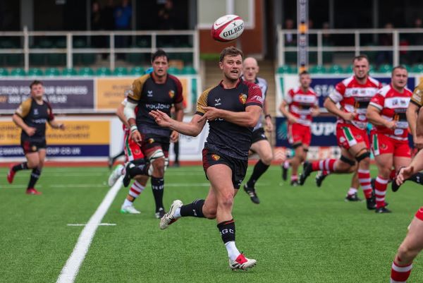 Photo of people playing rugby