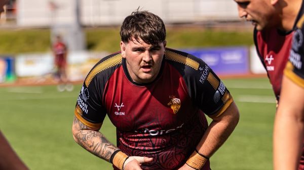 Photo of people playing rugby
