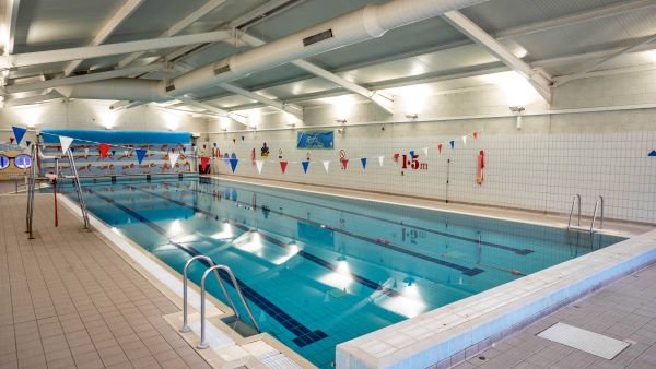 View across swimming pool from corner.